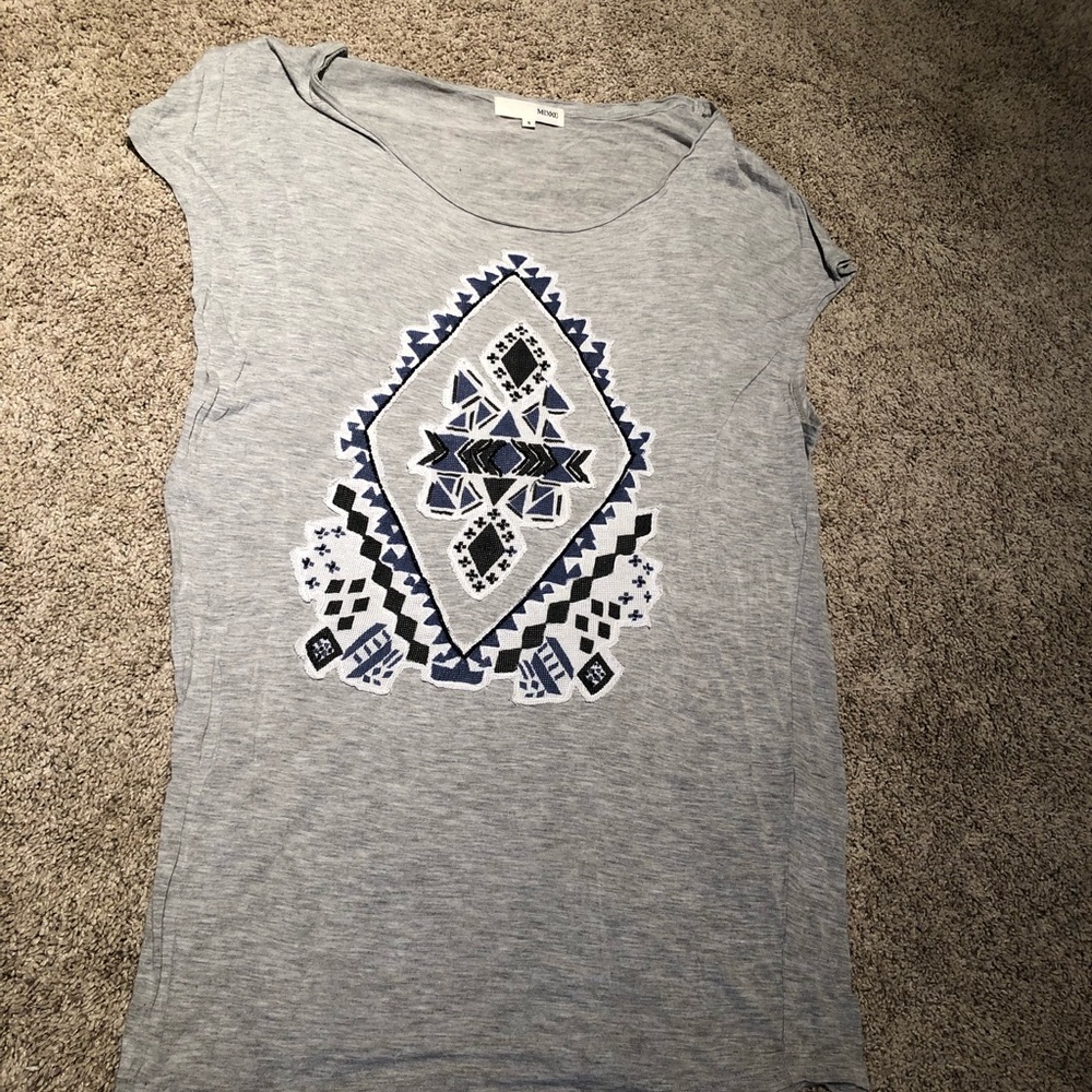 Gray top with detail art in the front
